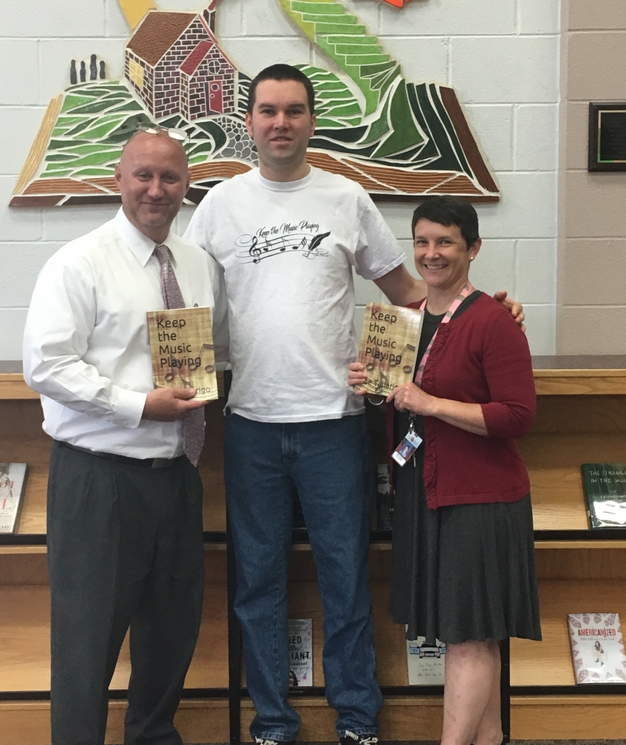 picture of author and principal and librarian